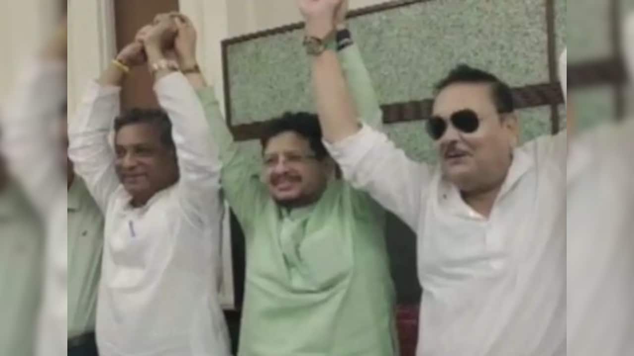 Madan Mitra (right) is the latest Mamata aide to switch sides Madan Mitra (right) is the latest Mamata aide to switch sides