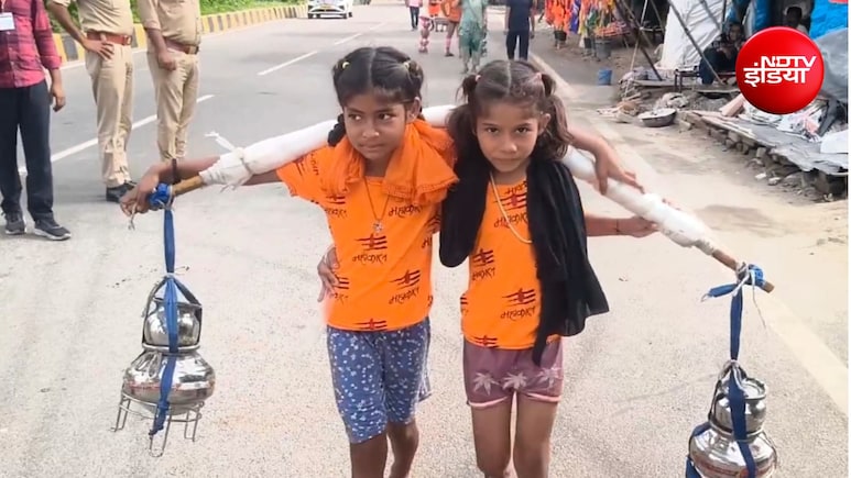 कंधों पर कांवड़, दिल में मम्मी-पापा की लंबी उम्र की चाह... 6 साल की बहनें हरिद्वार से मेरठ ले आई 11 लीटर जल