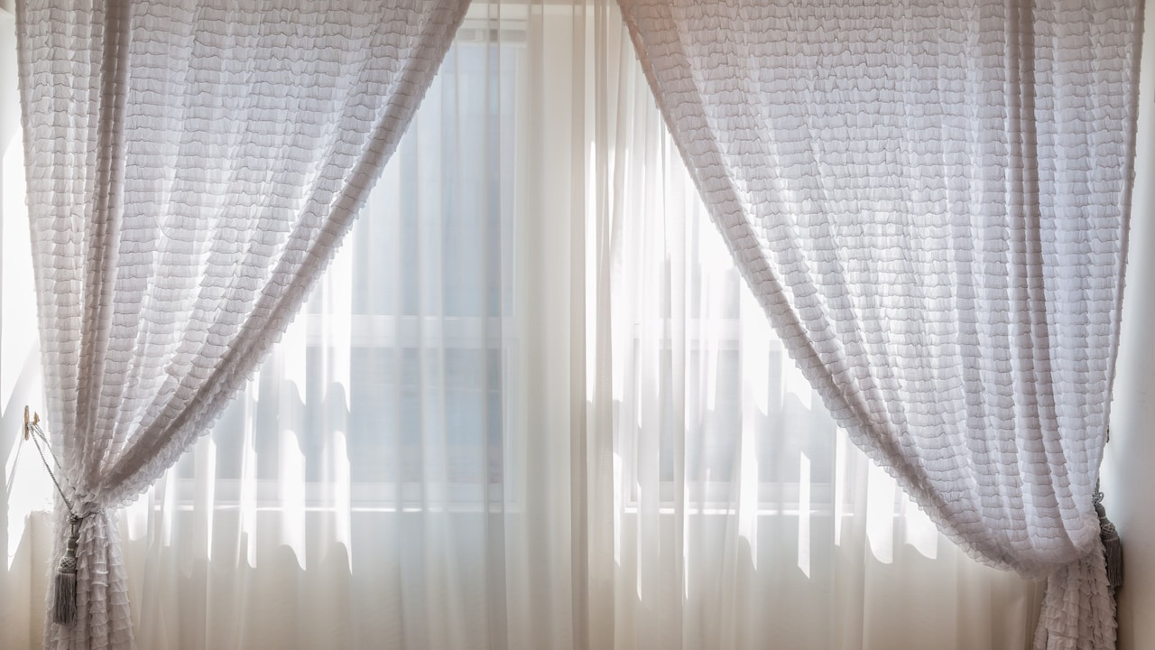 Add privacy without blocking natural sunlight with these sheer curtains Add privacy without blocking natural sunlight with these sheer curtains