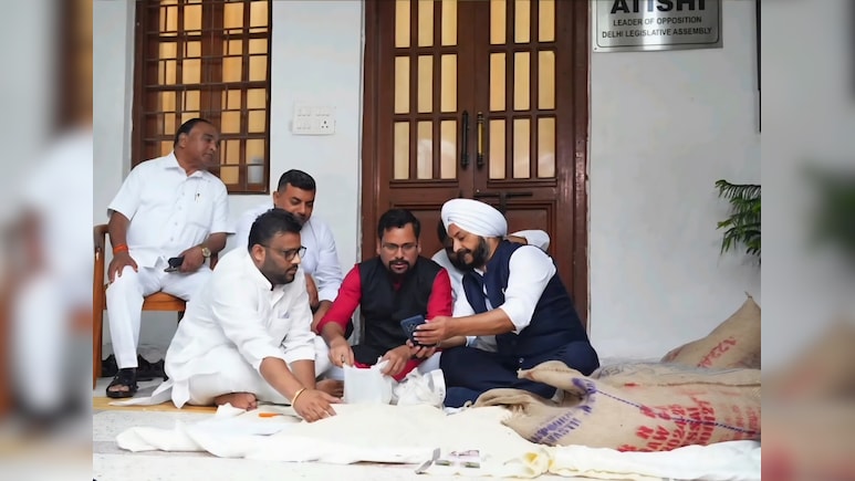 AAP MLAs Protest With Rice Bags In Delhi Assembly To Flag 'Scam', BJP Replies