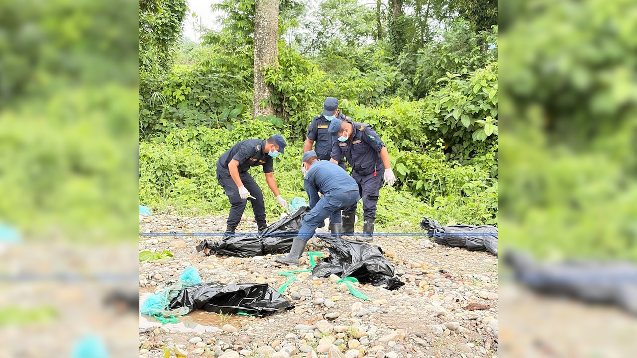 Nepal begins burying unidentified flood victims, using DNA for later identification