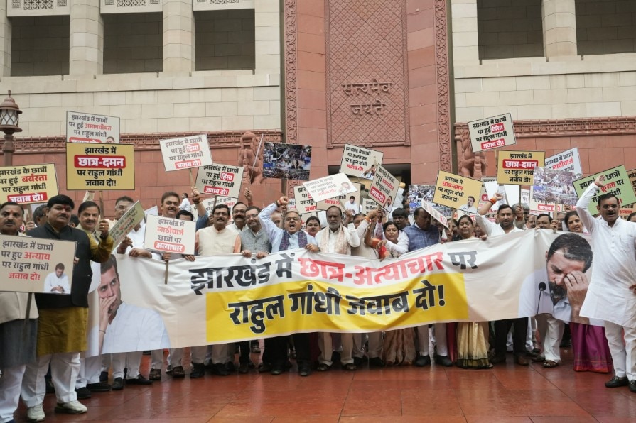 Ruling NDA MPs stage a protest against the brutal police action on job aspirants in Jharkhand Ruling NDA MPs stage a protest against the brutal police action on job aspirants in Jharkhand