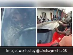 Kerala Driver Falls Asleep In Car Parked In Middle Of Busy Road, Local Try To Wake Him