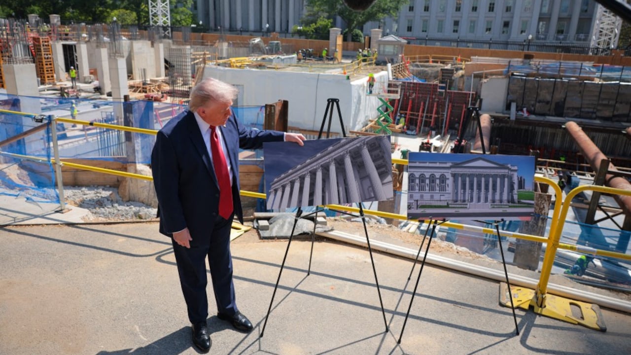 Donald Trump speaks to the media alongside posters of his proposed White House ballroom amid construction at the White House on May 19, 2026 Donald Trump speaks to the media alongside posters of his proposed White House ballroom amid construction at the White House on May 19, 2026