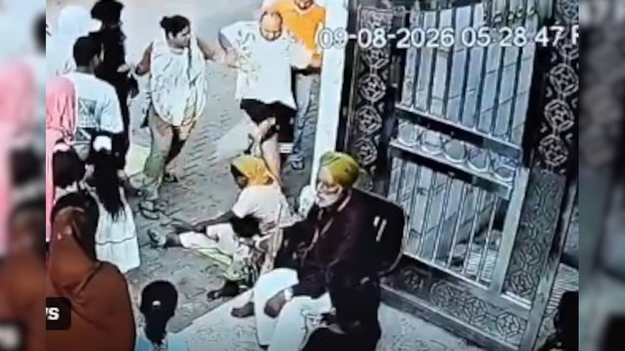 The man also kicked the woman beggar
