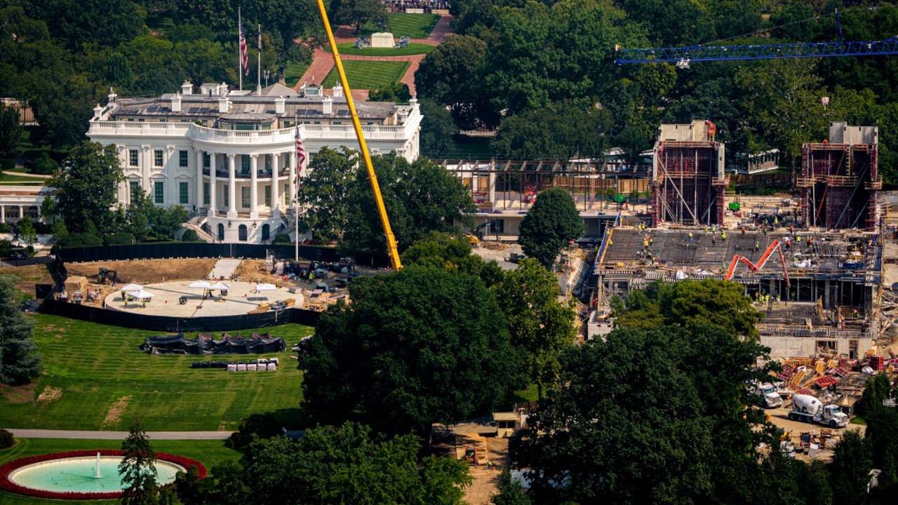 Construction continues on a new helipad on the South Lawn of the White House and the East Wing ballroom on August 10 Construction continues on a new helipad on the South Lawn of the White House and the East Wing ballroom on August 10