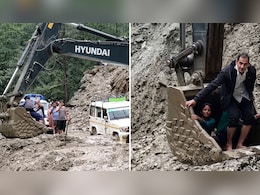 Video: Villagers Risk Lives, Use Excavator Bucket To Cross Landslide-Hit Road In Uttarakhand