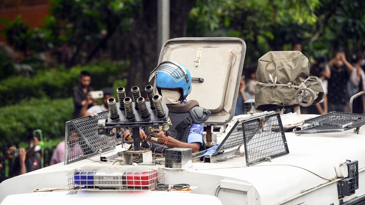 RAF personnel fires tear gas shells during the Cockroach Janta Party protests near Jantar Mantar on July 20