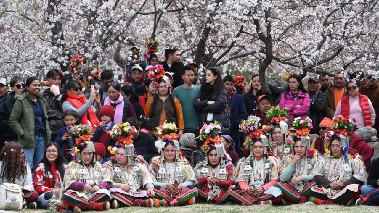 People wear traditional costumes to a celebration of the new season and blooming of apricot trees in Leh People wear traditional costumes to a celebration of the new season and blooming of apricot trees in Leh