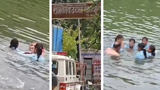 छात्राओं को गोद में उठाकर नहाता दिखा स्कूल प्रिंसिपल, पिकनिक के बहाने सभी को डैम में उतारा