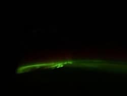 Astronaut Shares Auroras Glowing Outside Spacecraft Window, Calls It "Room With A View"