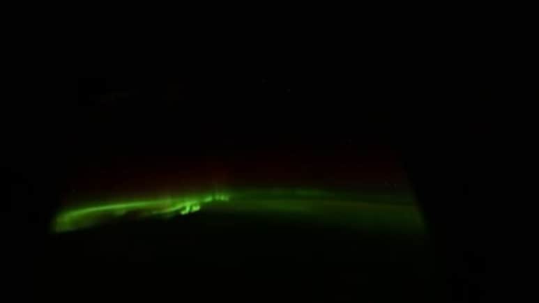 Astronaut Shares Auroras Glowing Outside Spacecraft Window, Calls It "Room With A View"