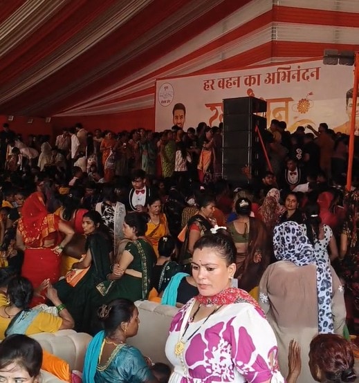 The picture captures the commotion during a Rakhi event in UP