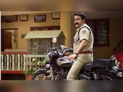 <i>Athimanoharam</i> First Look Out: Mohanlal's Cop Avatar Is Too Good To Miss