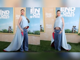Anne Hathaway Flaunts Baby Bump In Silk Prabal Gurung Top And Jeans At <i>The End Of Oak Street</i> Premiere
