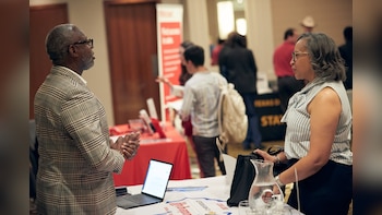 US Jobless Claims Edge Lower In Sign Of Steady Job Market