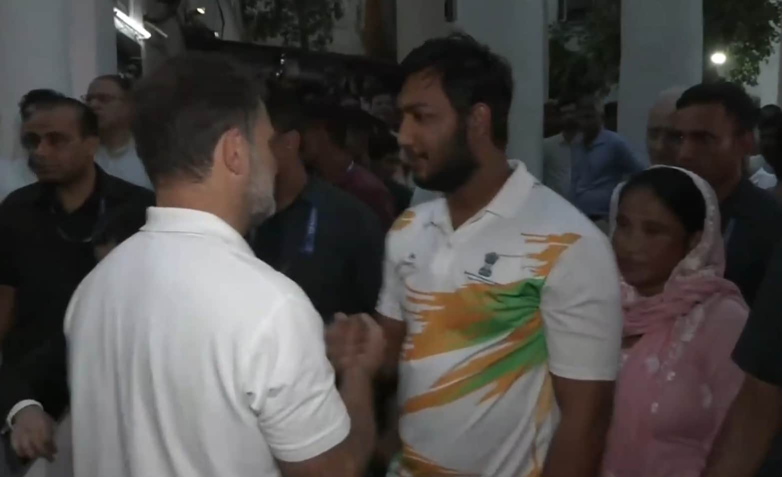 Rahul Gandhi seen shaking hands with Sahil Lochab after cops filed an FIR in his case Rahul Gandhi seen shaking hands with Sahil Lochab after cops filed an FIR in his case