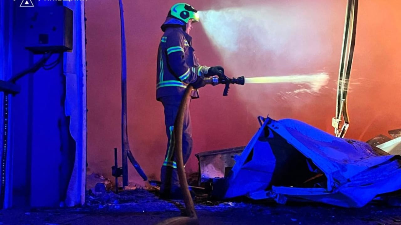 This handout photograph taken and released by Ukrainian State Emergency Service on August 5, 2026 shows rescuers putting out a fire in a warehouse premises damaged following massive Russian ballistic missile and drones strikes in the Ukrainian capital of Kyiv, amid the Russian invasion in Ukraine. This handout photograph taken and released by Ukrainian State Emergency Service on August 5, 2026 shows rescuers putting out a fire in a warehouse premises damaged following massive Russian ballistic missile and drones strikes in the Ukrainian capital of Kyiv, amid the Russian invasion in Ukraine.