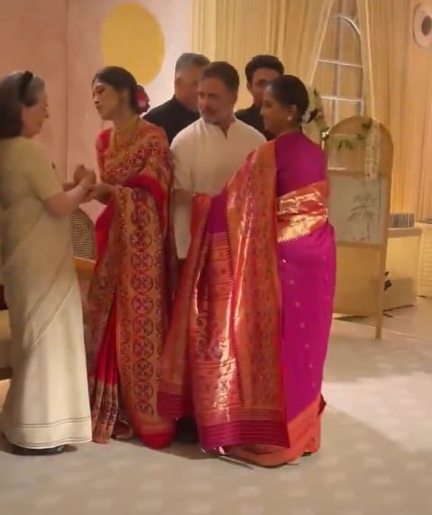 Supriya Sule brings in Rahul Gandhi right next to the couple Supriya Sule brings in Rahul Gandhi right next to the couple