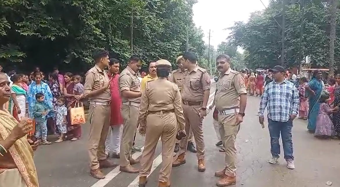 Police arrive at the scene as scores of women are injured at a Rakhi event in UP 