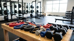 Resistance Bands vs Dumbbells: Which Is Better For Defined Arms?