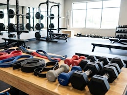 Resistance Bands vs Dumbbells: Which Is Better For Defined Arms?