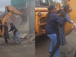 Video: Woman 'Hugs' Bulldozer As Land Dispute Turns Violent In Thane