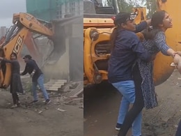 Video: Woman 'Hugs' Bulldozer As Land Dispute Turns Violent In Thane