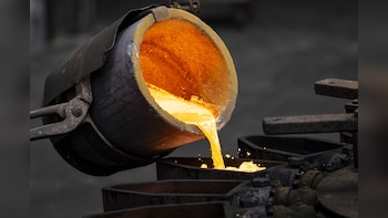 Gold Holds Near Three-Month High As Debasement Trade Returns