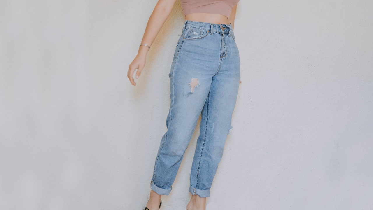 Why do some high waist jeans have gap in the back Why do some high waist jeans have gap in the back