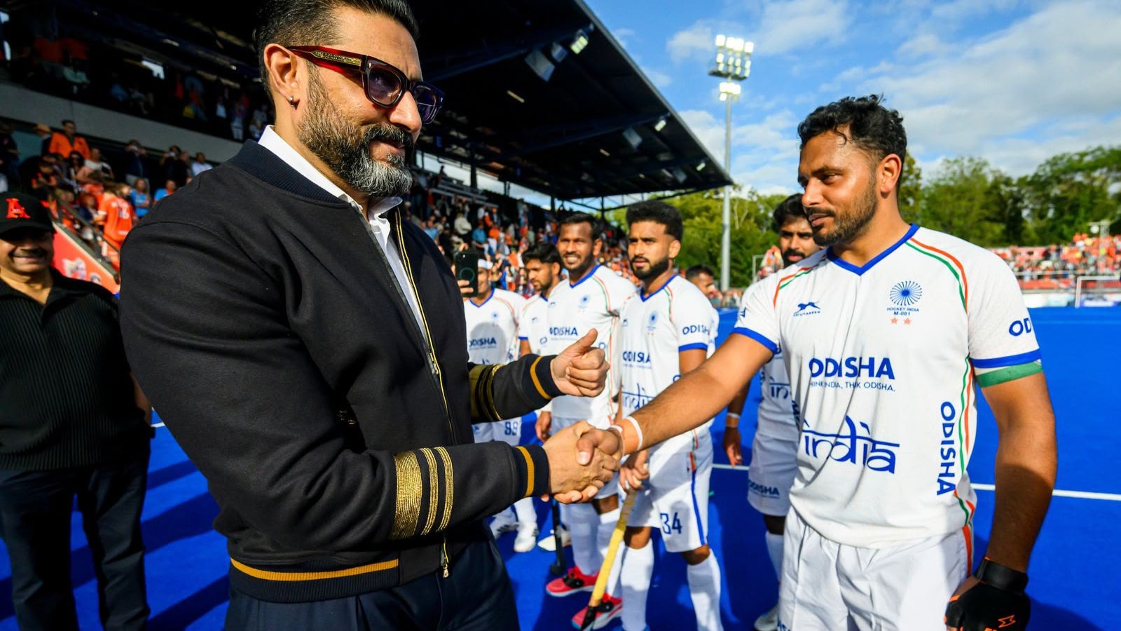 Why Is Abhishek Bachchan At The Hockey World Cup? Theres A Cricket Link