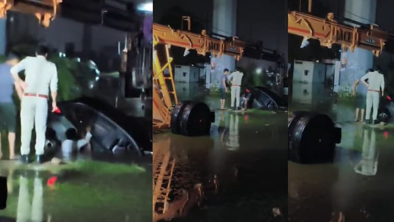 ग्रेटर नोएडा में बाइक सवार को बचाने के चक्कर में गड्ढे में गिरी कार, बाल-बाल बचा चालक