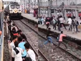 जिंदगी और मौत में चंद सेकेंड का फासला, ट्रेन बस 'छूकर' निकल गई, खौफनाक Video