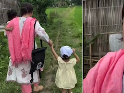 Viral Video Shows Assam Teacher On Census Duty With 2 Children By Her Side