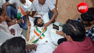 तिरंगा यात्रा में जाने से रोके जाने पर देवेंद्र महतो का प्रदर्शन, ICU के बाहर लेटकर प्रशासन से मांगा जबाव