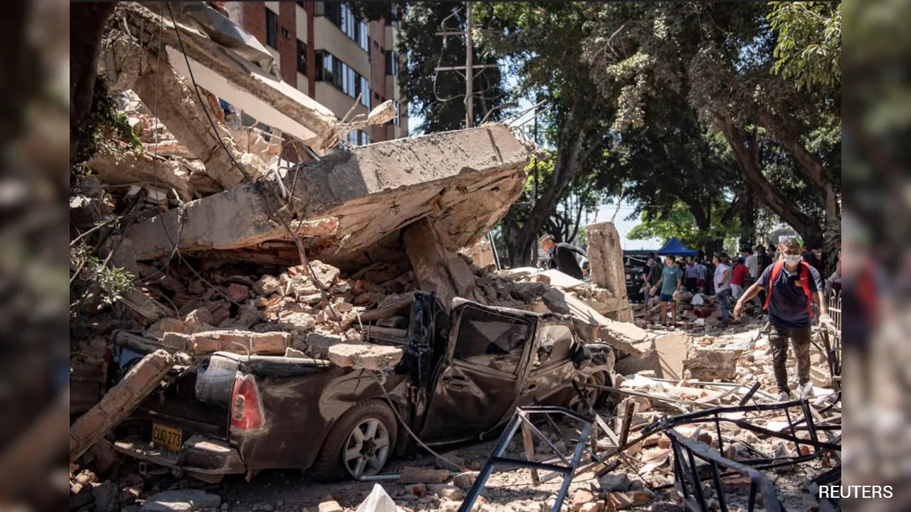 Colombia earthquake kills at least 132 as buildings collapse and aftershocks continue