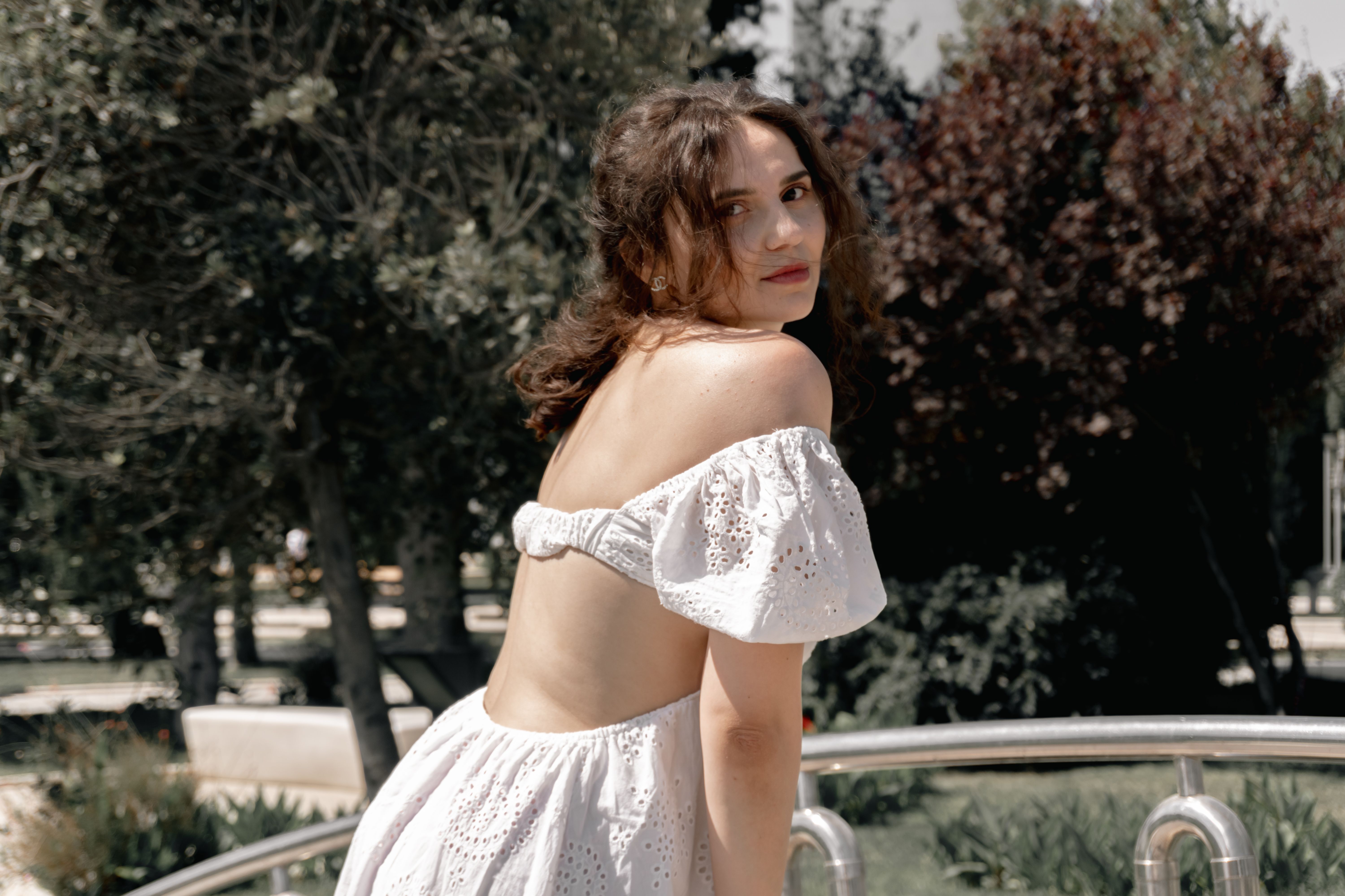 Backless And Beautiful: 5 Tops Every Vacation Suitcase Needs In 2026
