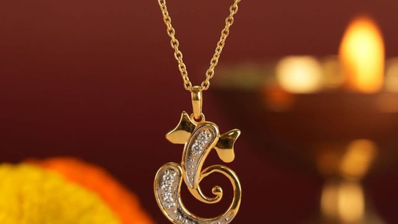 A premium Ganesha pendants in silver and gold A premium Ganesha pendants in silver and gold
