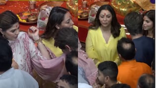 Video: Shah Rukh Khan Borrows Manager Pooja Dadlani's <i>Dupatta</i> At Lalbaugcha Raja, Internet Loves Their Bond