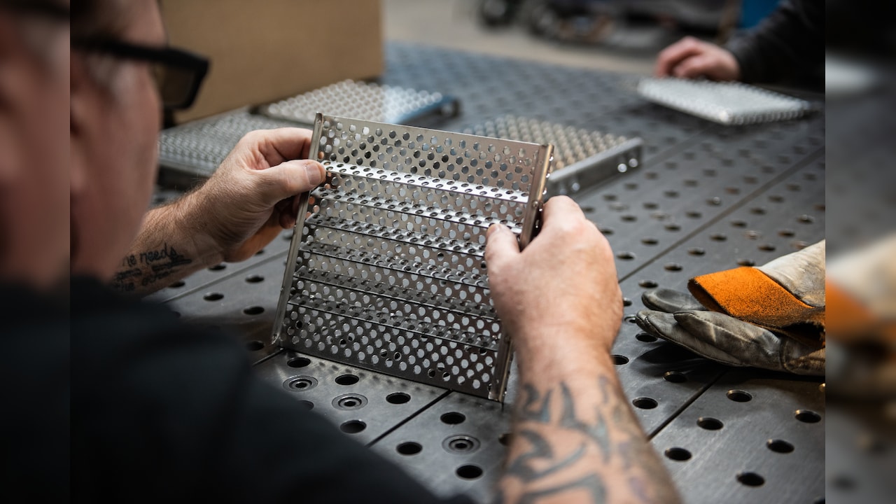 US Factory Gauge Eases But Holds Close To Four-Year High