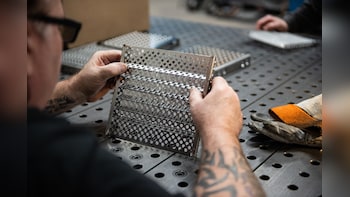 US Factory Gauge Eases But Holds Close To Four-Year High