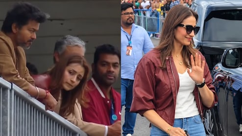 Trisha Krishnan Rocks Maroon Bomber Jacket, Denims As She Joins Vijay At Ajith Kumar's Silverstone Race