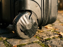 Why Are Travellers Putting Tape On Their Luggage Wheels Before Flights?