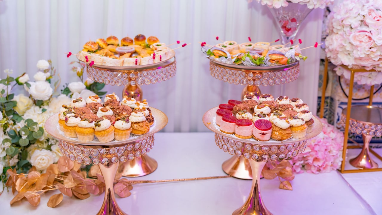 A tiered cupcake stand gives home-baked treats a neat, bakery-style display