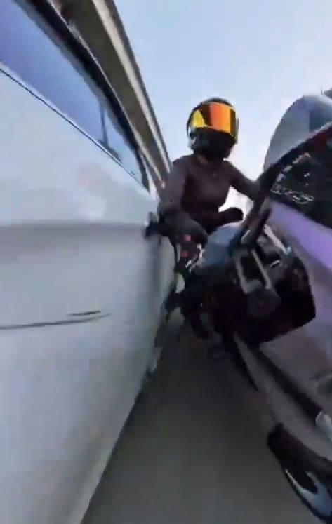 Biker Sia crashes after the white sedan rams her in Gurugram 
