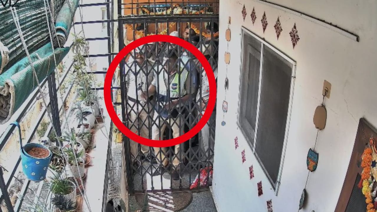 Cops breaking grill at Krishanks home with a hammer