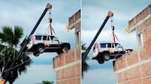 Fearing Theft, Mahindra Scorpio Owner Uses Crane To Park SUV On Rooftop