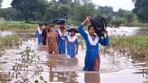 Schoolchildren Wade Through Floodwaters To Reach School In Madhya Pradesh's Chhatarpur