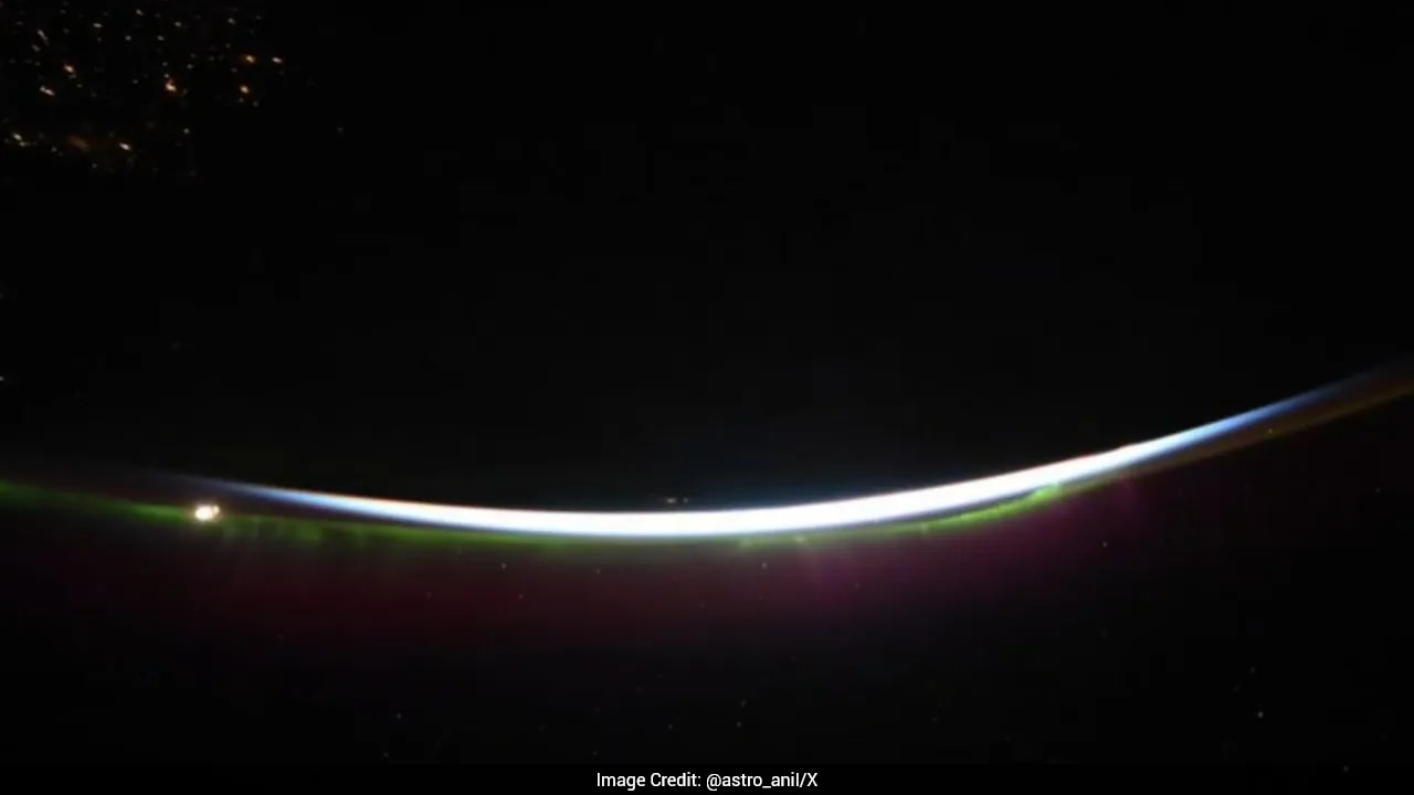 Astronaut Anil Menon Shares Purple Aurora Lighting Up The Darkness From Space Station