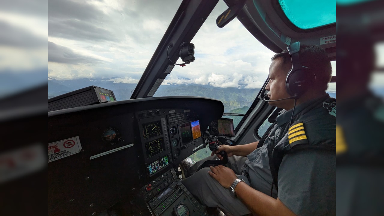 Colonel Rabindra Basnet (retired) at the controls of our helicopter